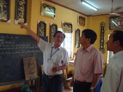 khảo sát việc thực hiện Đề án đào tạo nghề cho lao động nong thôn tại Trung tam day nghe Định Quán.jpg